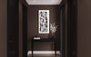 Large abstract black and white canvas art displayed in modern hallway