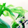 Vibrant abstract painting featuring bold, sweeping brushstrokes in various shades of green, creating a dynamic and energetic composition.
