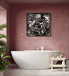 Large Abstract Art | Winter Skies 36x36"
A striking abstract painting in earthy tones decorates the wall above a modern white bathtub in this cozy bathroom setting.