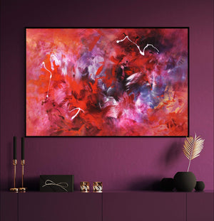 Vibrant abstract landscape artwork on canvas titled "Power of Love" displayed on a deep burgundy wall with minimalist decor elements in the foreground.