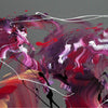Large abstract artwork with swirling brushstrokes in vibrant shades of red, purple, and white on a gray background. The dynamic, expressive painting conveys a sense of energy and movement.