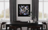 Earthy Abstract Art | Large Canvas Painting for Dining Room
This image shows a large abstract canvas art piece hanging on the wall in a modern dining room setting. The artwork features a vibrant, earthy color palette with swirling, dynamic brushstrokes that create a sense of movement and energy. The painting is the focal point of the room, complementing the dark, minimalist furniture and decor. The overall scene suggests a sophisticated and stylish space perfect for gathering and entertaining.