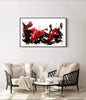 Expressive abstract landscape art with bold red and black brushstrokes displayed on living room wall