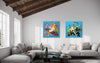 Diptych painting | Summer In The City I and II 40x80" - Abstract artwork depicting colorful, dynamic compositions in earthy tones, displayed on the wall of a modern living room with exposed wooden beams.