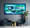 Vibrant Teal Abstract Art | Underwater Kingdom I 36x72"
Captivating abstract landscape painting featuring an underwater scene with whimsical shapes and earthy tones, displayed on a wall in a modern living space with gray armchairs and a potted plant.
