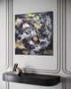 Square Abstract Painting | Golden Snowflakes 100x100cm - Earthy color art featuring a modern abstract design with splashes of yellow, black, and brown on a large canvas.