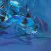 Vibrant blue abstract canvas painting with dynamic brushstrokes and fluid shapes evoking a sense of movement and depth