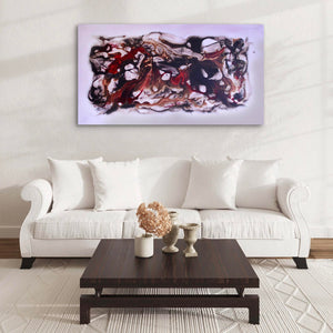 Vibrant abstract landscape artwork | Captivating large canvas painting featuring swirling, colorful brushstrokes in shades of red, black, and white displayed above a modern white sofa and dark wooden coffee table in a minimalist living room setting.