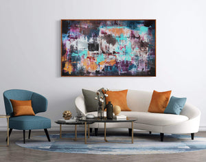 Large abstract landscape painting | Northern Mirage 36x60" displayed on living room wall, surrounded by modern furniture and decor items