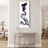 Captivating Minimalist Art | Evolution 18x48" - Abstract artwork featuring bold, expressive brushstrokes in a modern, minimalist style, displayed on a wall in a cozy, inviting home interior.