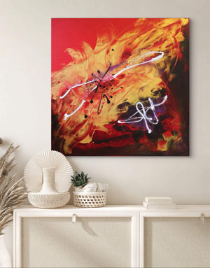 Large abstract painting of a vibrant, fiery dragonfly on a red background displayed on a wall above shelves with decorative items.