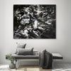 Black and white abstract canvas painting with dynamic brushstrokes, suitable for modern interior decor.