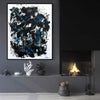 Expressive Art | Blue Velvet 44x55" - Large abstract painting featuring bold brushstrokes in blue, black, and white, displayed in a modern home interior with a fireplace.