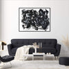 Expressive black and white abstract art piece | Eclipsed Dreams 36x48" displayed above modern sofa in minimalist living room setting