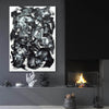 Expressive abstract painting in black and white, modern artwork displayed in minimalist home interior with fireplace