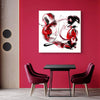 Bold abstract painting in red and black hues on white canvas, displayed on a red wall above a minimalist black table and two red upholstered chairs, creating a modern, stylish decor.