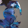 Colorful abstract art with flowing blue and purple brushstrokes on a dark background