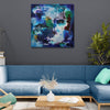 Abstract painting of blue haven, contemporary square artwork with earthy colors, large canvas art piece displayed in modern living room setting