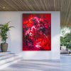 Vibrant abstract art piece | Large red and pink abstract painting on canvas displayed in modern home interior