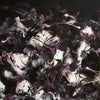 Dramatic abstract landscape featuring bold brushstrokes in shades of black, purple, and white, creating a captivating monochrome composition.