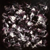 Large abstract painting of a midnight garden featuring expressive black and white strokes with hints of purple hues, creating a dramatic and moody artistic composition.