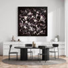 Dramatic abstract art piece in monochrome tones, showcasing an artistic display of brushstrokes and textures, adorning the modern dining room setting.