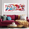 Vibrant Abstract Canvas Art | Dreams Like This 20x48"
This large abstract landscape artwork features a vibrant mix of colors and dynamic brush strokes, creating a captivating and modern visual experience. The painting is displayed on the wall above a cozy red sofa, complementing the interior decor.