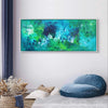 Captivating abstract landscape painting in shades of blue and green, displayed in a modern living room setting with cozy seating and natural decor elements.
