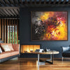 Vibrant abstract landscape art | Large colorful painting of fiery explosion displayed in modern living room with wooden accents and furniture