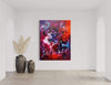 Vibrant abstract artwork | Colorful canvas painting with bold brushstrokes and earthy tones | Large contemporary art piece displayed in modern interior setting