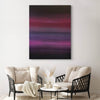 Vibrant geometric abstract art on canvas depicting a dramatic landscape with bold purple, pink, and black hues. The painting is displayed prominently on the wall of a modern living room setting with neutral-toned furniture and decor.