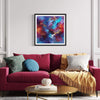 Vibrant abstract art print titled "Violet Skies" displayed on a wall above a red couch in a modern living room setting.