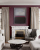 Elegant abstract artwork in living room featuring Rothko-inspired painting, marble fireplace, and gray armchair.