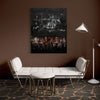 Minimalist abstract landscape painting of an island in the shadows on dark wall above seating area with modern white furniture and floor lamp