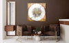 Large abstract square mixed media artwork titled "Light Falls Away" displayed on the wall in a modern living room setting with brown chairs and a wooden side table.