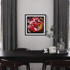 "Butterfly Dance" Signed Edition Art Print - Vibrant abstract artwork featuring a dynamic butterfly-like composition in earthy tones, displayed on a dining table with minimalist decor.