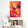 Rectangular abstract painting titled "Finding Yourself" with vibrant red, orange, and yellow brushstrokes displayed on a wall above a wooden entertainment unit with white decor.