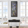 Large abstract painting titled "Dance with Me" in an earthy color palette featuring swirling, energetic brushstrokes in shades of brown, purple, and gold. The painting is displayed in a modern living room setting with large windows overlooking a scenic view. The painting is a vibrant, textured work that adds a focal point and artistic touch to the room's decor.