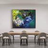 Extra large abstract landscape painting titled "Chasing The Sunshine" by artist Paresh Nrshinga, featuring vibrant green, blue, and yellow brushstrokes, displayed in a modern dining room setting with minimalist furniture.