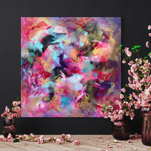 Vibrant abstract painting with swirling colors and dynamic brushstrokes, surrounded by delicate pink cherry blossoms in vase, creating a serene and artistic ambiance.