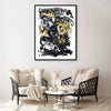 Large abstract painting depicting dynamic black, white, and gold brushstrokes on canvas