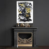 Large abstract artwork with black, white, and yellow paint strokes on a dark wall above a fireplace mantel.