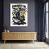minimalist-abstract-art-to-buy-london-Striking abstract art | Large black, white and yellow painting with bold brush strokes framed on a wooden cabinet in modern room