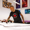 Vibrant abstract paintings | Painter at work creating modern art on canvas in Converse shirt