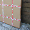 Cardboard boxes with "Fragile" warning labels, displayed in a room with a wooden background.