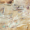 Textured abstract art with mixed media in warm tones of beige, brown, and gold, featuring a striking geometric and organic composition.