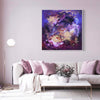 Vibrant Purple Canvas Painting | Temptation II 100x100cm - Original abstract art with earthy color palette, displayed on wall in modern living room setting with plush white sofa and floral accents.