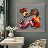 Vibrant abstract art | Fiery Symphony III 36x36"
Colorful abstract painting with bold brushstrokes in shades of red, yellow, and purple displayed on a wall in a modern home decor setting.