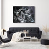 Striking abstract canvas artwork | Dramatic black and white composition with swirling, ethereal brushstrokes creates a captivating visual impact in this modern living room setting.