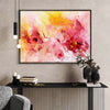 Vibrant abstract floral painting | Colorful pink, yellow, and red blooming flowers on canvas artwork displayed in modern living room